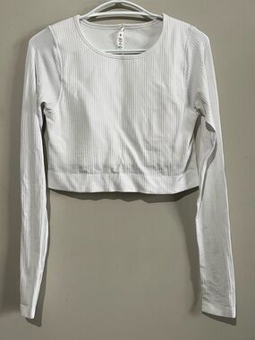 Lululemon Ebb to Street Long Sleeve
White size 8